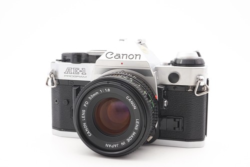 Canon program camera - ae-1, +
