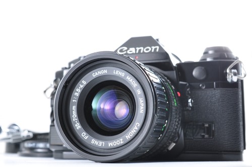 Canon program zoom lens - /,